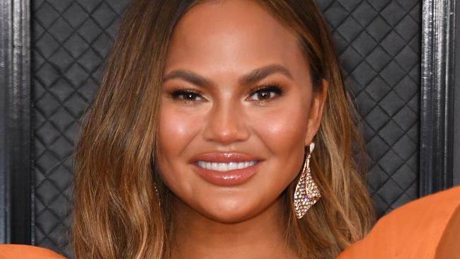 US model Chrissy Teigen arrives for the 62nd Annual Grammy Awards on January 26, 2020, in Los Angeles. (Photo by VALERIE MACON / AFP)