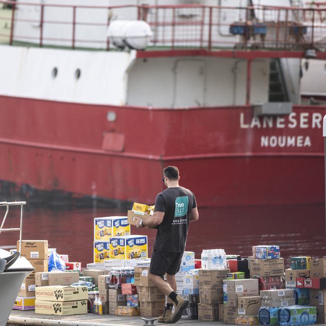 Provisions are loaded on to a small vessel today. Picture: Darren Leigh Roberts