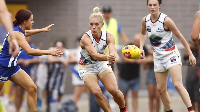 Adelaide’s Erin Phillips fired off a handball. Picture: AAP