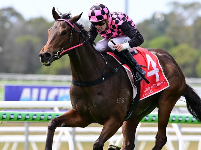 Cosmo Centaurus dashes away to win the $100,000 Inglis bonus for Rob Heathcote and jockey Bailey Wheeler at the Sunshine Coast. Picture: Grant Peters - Trackside Photography.