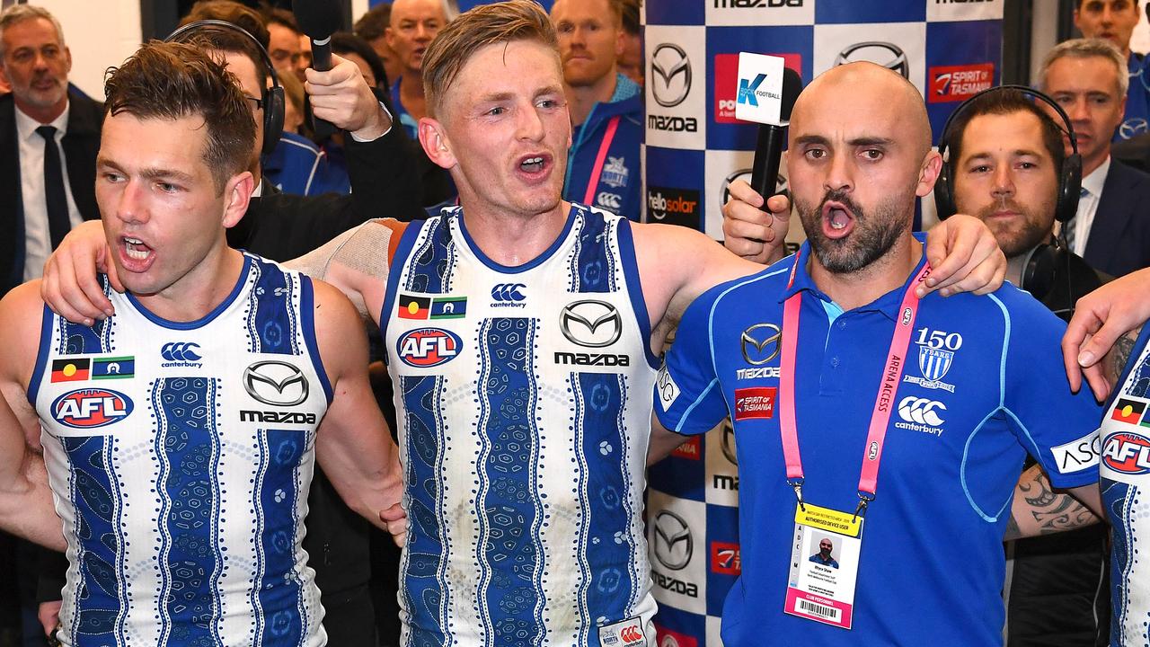 North Melbourne players Shaun Higgins and Jack Ziebell, and interim coach Rhyce Shaw after beating Richmond a fortnight ago. (Photo by Quinn Rooney/Getty Images)