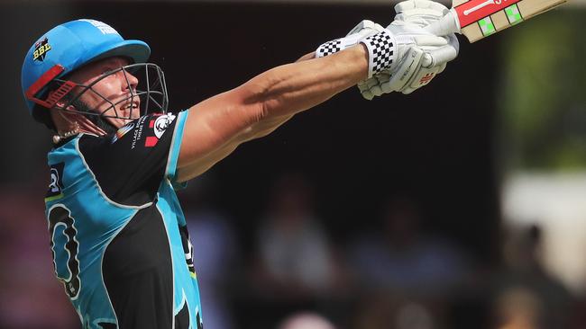 Chris Lynn of the Heat hits a boundary.