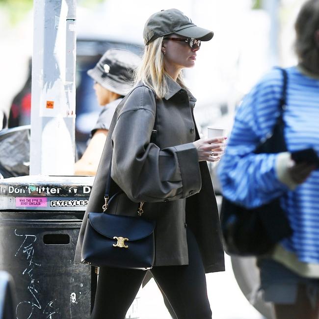 Margot covers up in a baggy coat in New York on June 7. Picture: JosiahW / BACKGRID