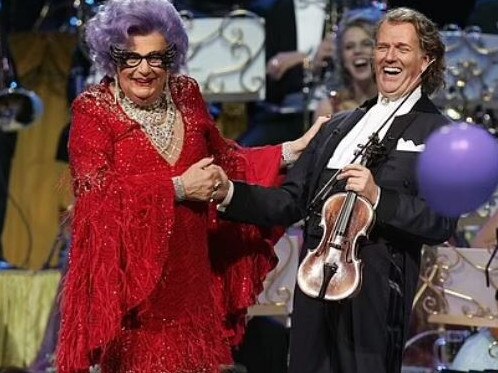 Dame Edna Everage with violinist Andre Rieu. Picture: Getty Images