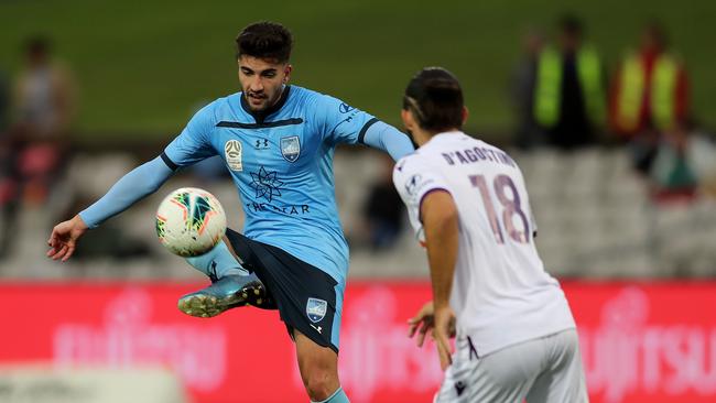 Paulo Retre (left) has parted ways with Sydney FC. Picture: Scott Gardiner/Getty Images