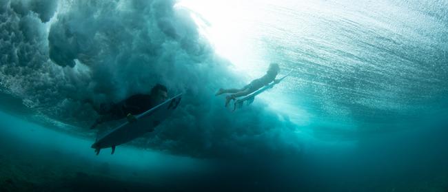 Mark Richardson (left) and son Ty Richardson surfing together. Picture credit: George Harper.