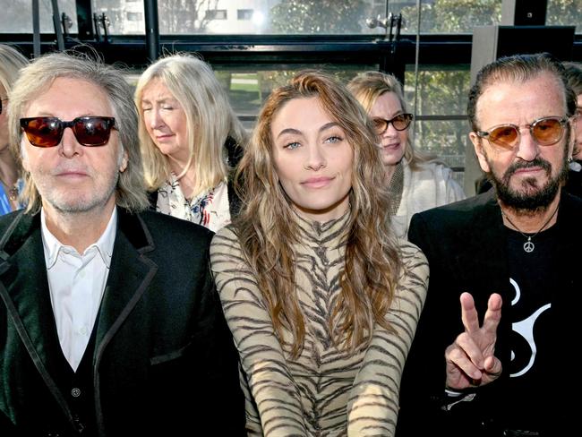 TOPSHOT - (L-R) British rock singer Sir Paul McCartney , US model and actress Paris Jackson, British rock musician Sir Ringo Star and his wife US actress Barbara Bach attend ahead of the presentation of creations by Stella McCartney for the Women Ready-to-wear Fall-Winter 2024/2025 collection as part of the Paris Fashion Week, in Paris on March 4, 2024. (Photo by MIGUEL MEDINA / AFP)