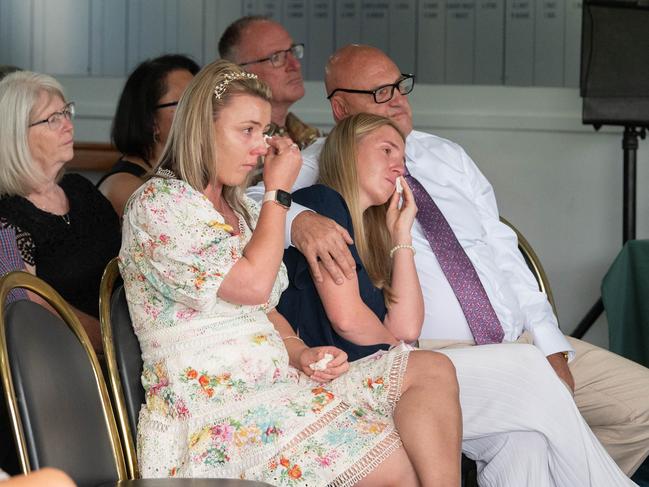 Demi, Gabbie and Paul Clark at the funeral service for John, Cynthia and Jacqueline Clark, held at Centenary Park, Snowtown on Monday, November 20, 2023. (The Advertiser/ Morgan Sette)