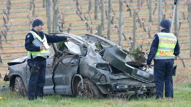 Police at the scene of the fatal crash. Picture: Lawrence Pinder.