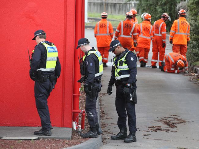 Police and SES search around Mountain Highway in Bayswater where a car linked to an alleged shooting was found. Picture: David Crosling