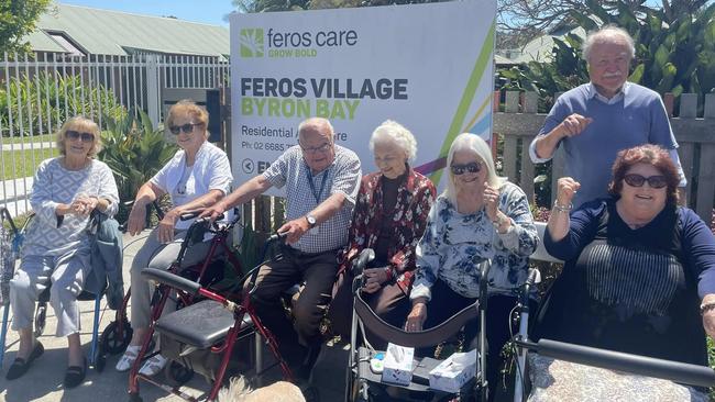 Happy Feros Village Byron Bay residents from left: Charmian Podesta, Sybil Reddan, Mick Eddings, Kate Smorty, Bernadette Dean, Rhonda Strand, and Henning Jensen.