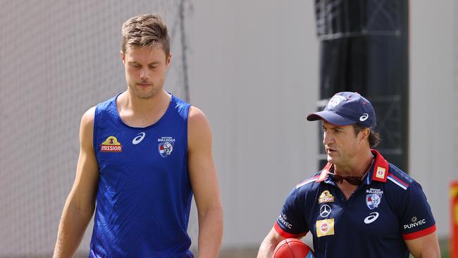 Josh Schache chats to coach Luke Beveridge at Bulldogs training. Picture: Michael Klein