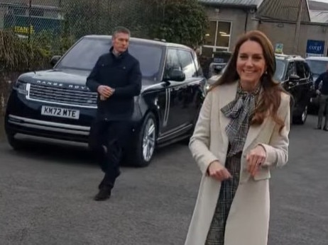 Princess Catherine dashes from her security convoy to greet a young royal fan, Picture: Facebook