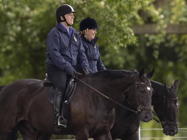 Prince Andrew was spotted riding with a friend as his family gathered on the balcony of Buckingham Palace. Picture: danapress / MEGA