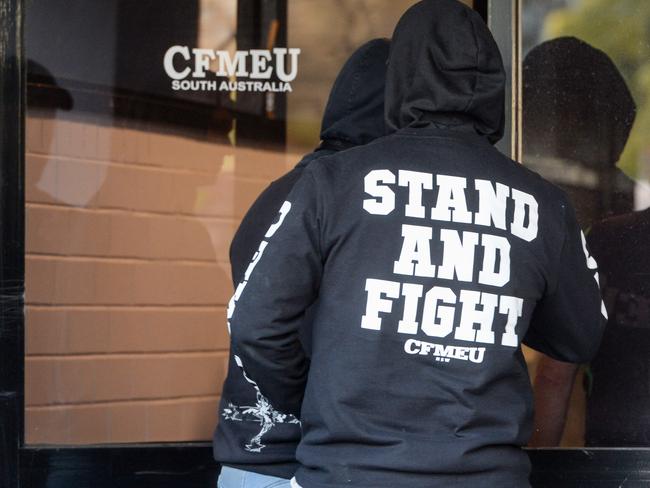 AUGUST 3, 2022: CFMEU members arrive at the South Australian headquarters ahead of a meeting. Picture: Brenton Edwards