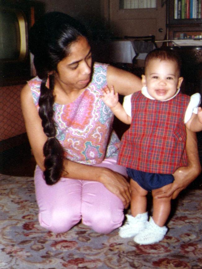 Kamala Harris stands supported by her mother Shyamala in an undated photo.