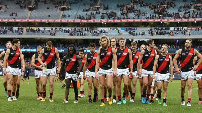 Dyson Heppell leads his team off the MCG after losing to Carlton. Picture: Michael Klein