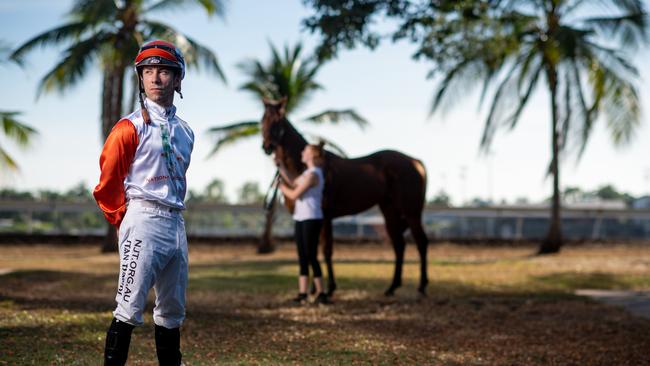 Jockey Stan Tsaikos with Hattan Man. He'll be wearing special silks for the commemorative race that honours Melanie Tyndall who died when she fell off her horse during a race in Darwin in 2019. Picture: Che Chorley