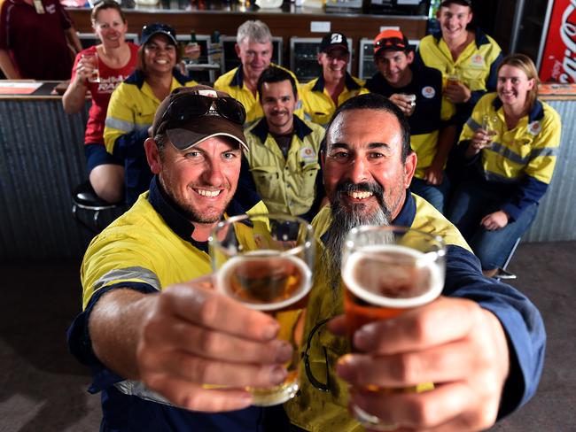 Head of emergency services manager Jason Carroll and boilermaker Allan Dableh enjoying beers with Alinta work mates at the Leigh Creek hotel - after their last shift at the mine. Picture: Tom Huntley