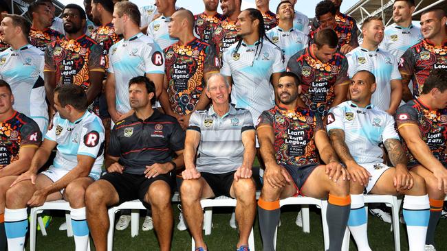 Laurie Daley, Wayne Bennett and Greg Inglis line up for the All Stars photo. Pic Darren England.