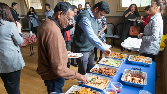 Victorian Multicultural Commission advisers shared a meal prepared at Glen Waverley's House of Delight.