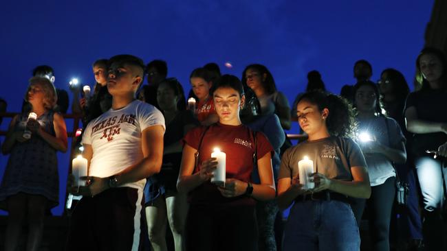 Texans held a vigil for victims of the El Paso shooting on Saturday August 3. Picture: AP/John Locher