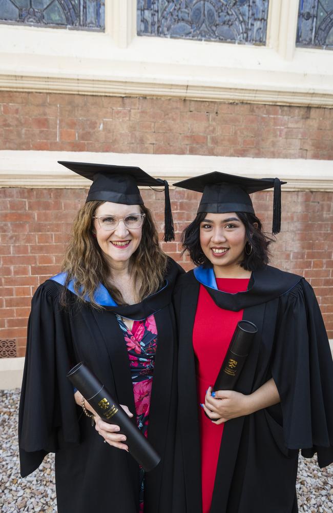 Bachelor of Nursing graduates Louise McDonald (left) and Ana Malferrari at a UniSQ graduation ceremony at Empire Theatres, Tuesday, October 31, 2023. Picture: Kevin Farmer