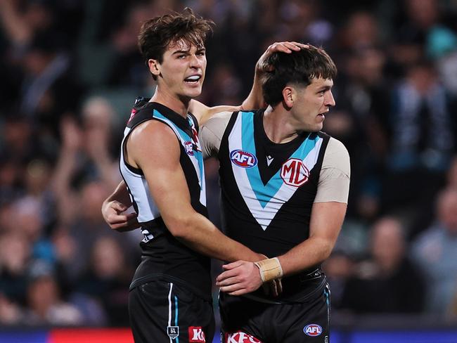 ADELAIDE, AUSTRALIA - JUNE 15: Connor Rozee and Zak Butters of the Power celebrate a goal during the 2023 AFL Round 14 match between the Port Adelaide Power and the Geelong Cats at Adelaide Oval on June 15, 2023 in Adelaide, Australia. (Photo by James Elsby/AFL Photos via Getty Images)