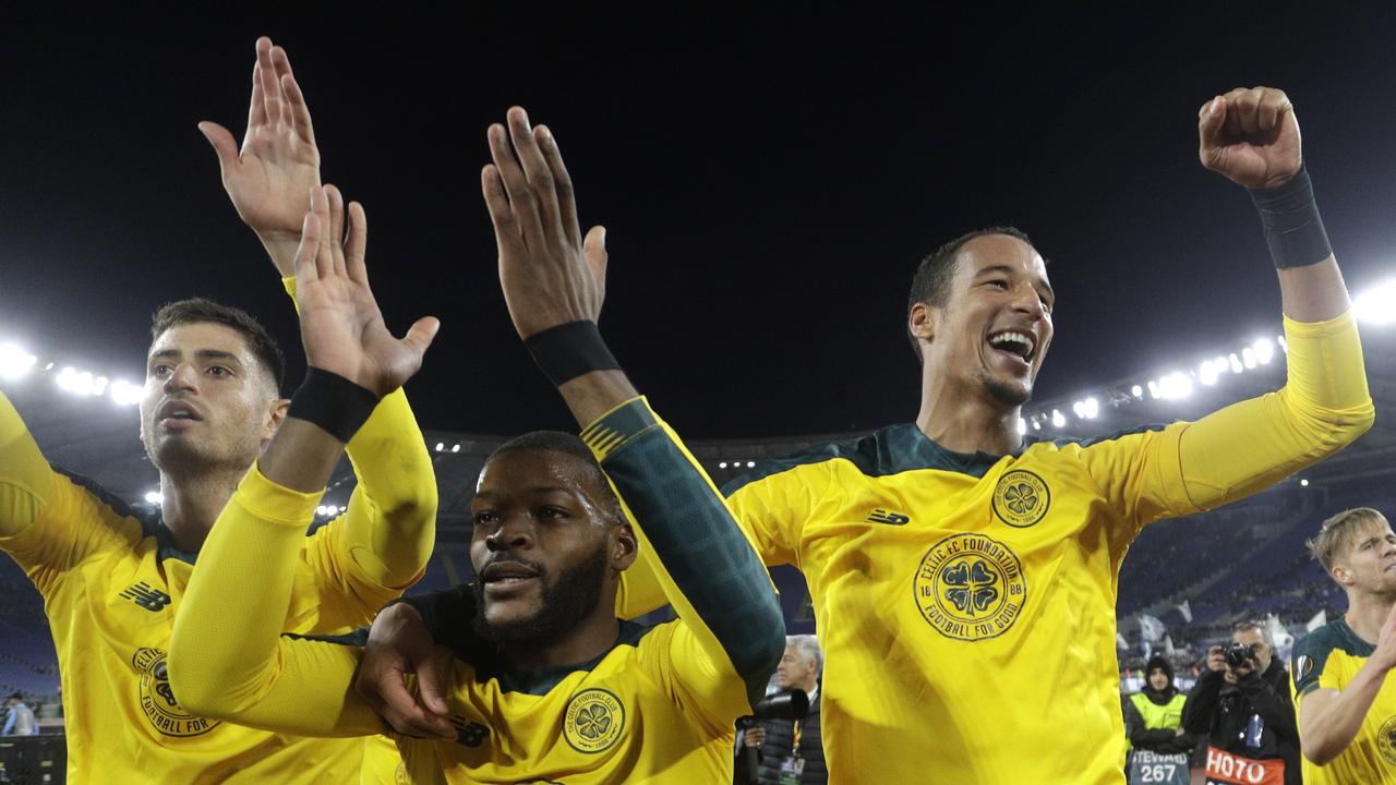 Celtic's Olivier Ntcham (C) celebrates a remarkable last-gasp winner.