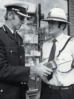 Pith helmet and handheld radio 1963