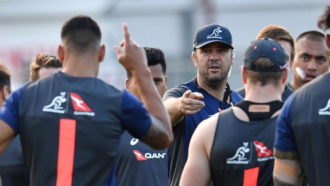 Wallabies coach Michael Cheika (centre) is seen during training at Ballymore in Brisbane, Tuesday, June 5, 2018. The Australian Wallabies are facing Ireland in the first test of a three game series on June 9 at Suncorp Stadium in Brisbane. (AAP Image/Darren England) NO ARCHIVING