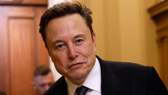 WASHINGTON, DC - DECEMBER 05: Tesla CEO Elon Musk, Co-Chair of the newly announced Department of Government Efficiency (DOGE), arrives on Capitol Hill on December 05, 2024 in Washington, DC. Musk and his Co-Chair, businessman Vivek Ramaswamy are meeting with lawmakers today about DOGE, a planned presidential advisory commission with the goal of cutting government spending and increasing efficiency in the federal workforce.   Anna Moneymaker/Getty Images/AFP (Photo by Anna Moneymaker / GETTY IMAGES NORTH AMERICA / Getty Images via AFP)