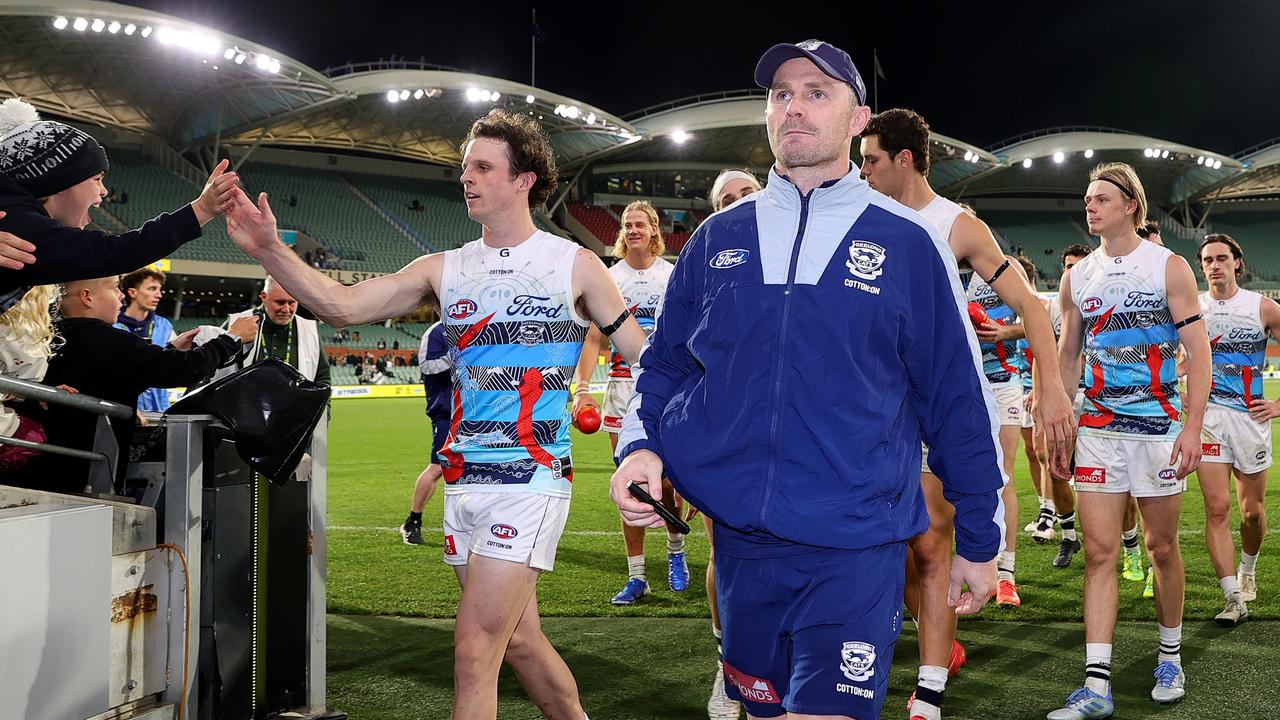 An injured Patrick Dangerfield leads his Cats off the field after a domination of Port Adelaide in Round 10. Picture: Sarah Reed/AFL Photos via Getty Images.