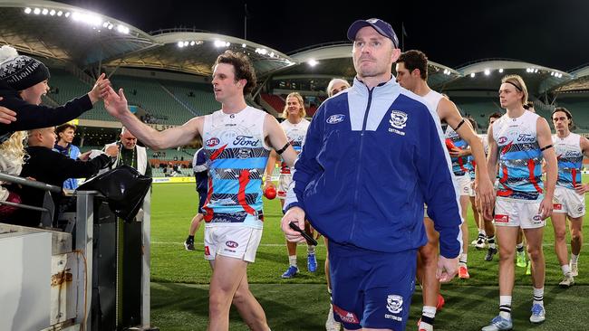 An injured Patrick Dangerfield leads his Cats off the field after a domination of Port Adelaide in Round 10. Picture: Sarah Reed/AFL Photos via Getty Images.