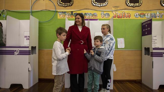 Labor’s Kristy McBaincasts her vote at Merimbula Public School with her children Ruby, 10, Max, 8 and Jack, 5. Picture: Sean Davey.