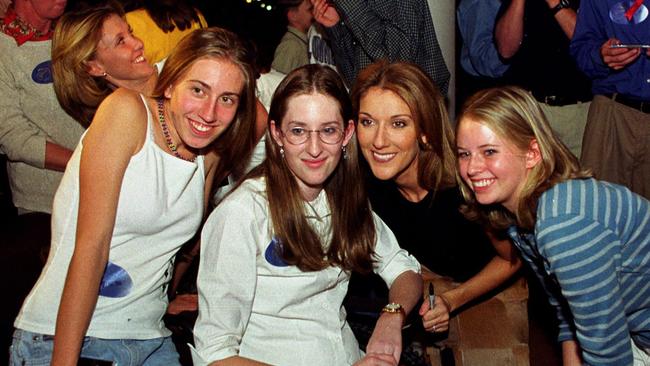 Celine Dion, second from right, with Columbine High School students, from left, Beth Ratay, Anne Marie Hochhalter and Kim Chlumsky, six months after the massacre. Picture: The Denver Post