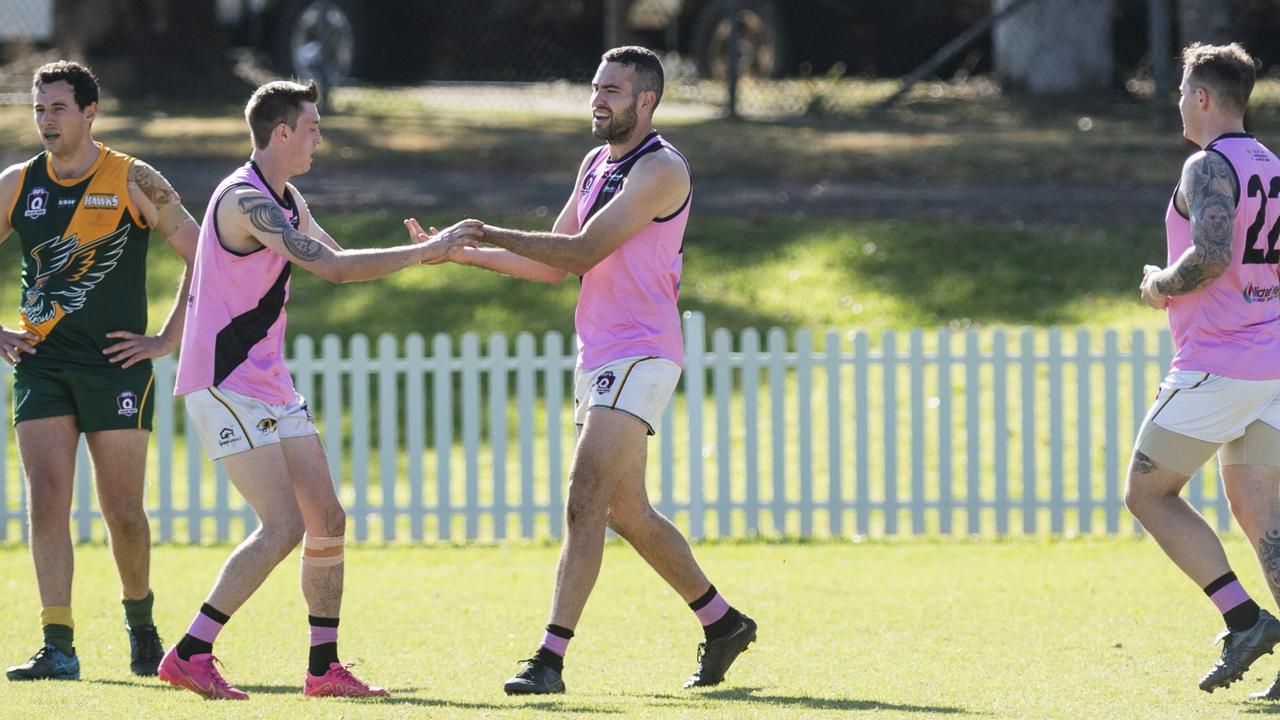 Rohan Drummond (centre) celebrates a goal for Toowoomba Tigers. Picture: Kevin Farmer