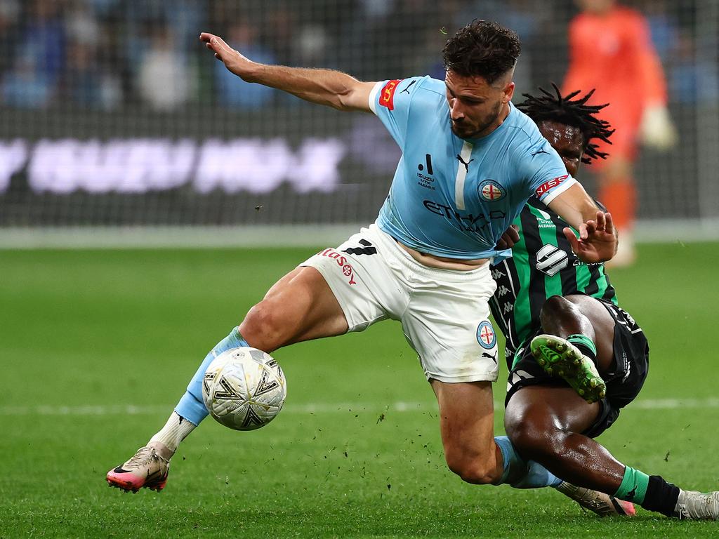 Melbourne City’s Mathew Leckie (left) battles with Western United’s Abel Walatee in an A-League semi-final first-leg clash at AAMI Park. Picture: Morgan Hancock/Getty Images