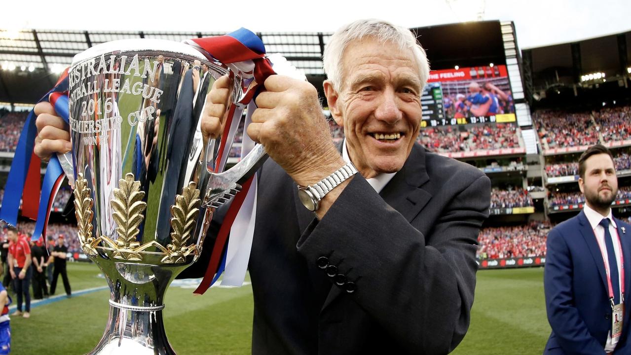 Footscary legend and 1960 Brownlow Medallist John Schultz died at 85. He’s pictured here with the 2016 AFL premiership cup won by the Western Bulldogs. Picture: AFL Photos