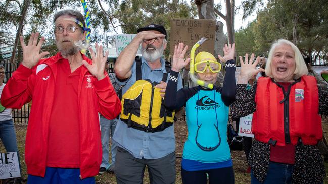 Protesters outside the Adelaide Aquatic Centre said they had come to defend the parklands trees from plans to upgrade the facility. Picture: Emma Brasier