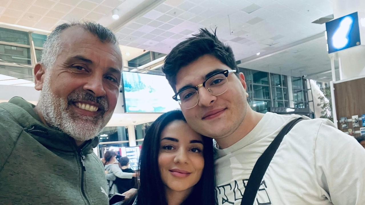 Mr Pavlou with his family after touching down at the airport. Picture: @DrewPavlou / Twitter