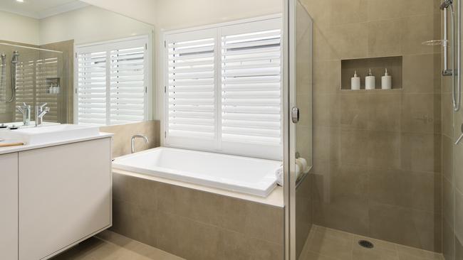 Separate shower and bath in the bathroom.