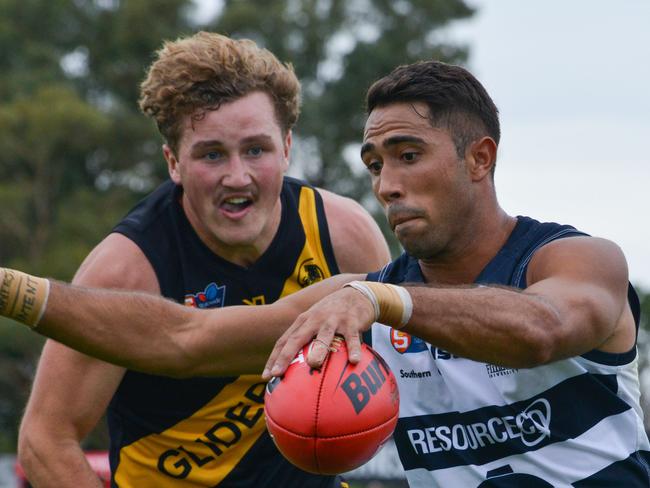 SANFL: Glenelg v South Adelaide at Glenelg Oval, Saturday, April 13, 2019.South's Malcolm Karpany is chased by Will Gould.  (AAP Image/Brenton Edwards),