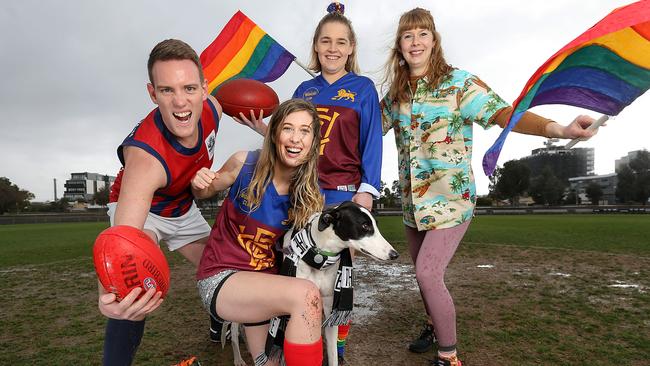 Renegade Pub Football League players Wayne Huntley, Katie Cullen, Georgia Bath, and Courtney Cameron, and Monty the dog, are fired up for the league’s first ever Pride Round. Picture: Ian Currie