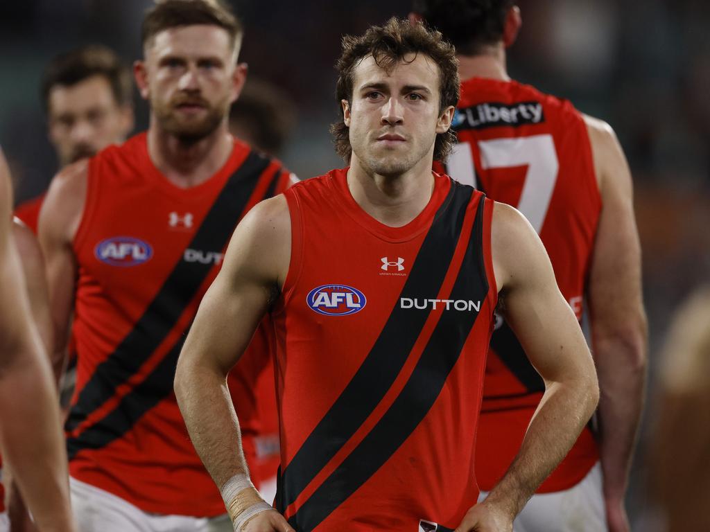 Andy McGrath leaves the field after the Bombers’ defeat at the hands of Port Adelaide. Picture: Michael Klein