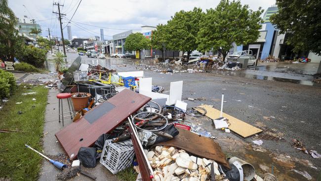 Rubbish in the street outside businesses at Auchenflower after the floods. Picture: Peter Wallis/Getty Images