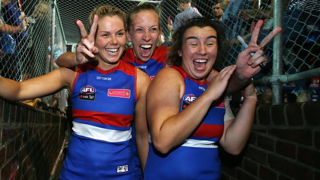 Katie Brennan, Lauren Spark and Bonnie Toogood celebrate after the game. Picture: Michael Klein