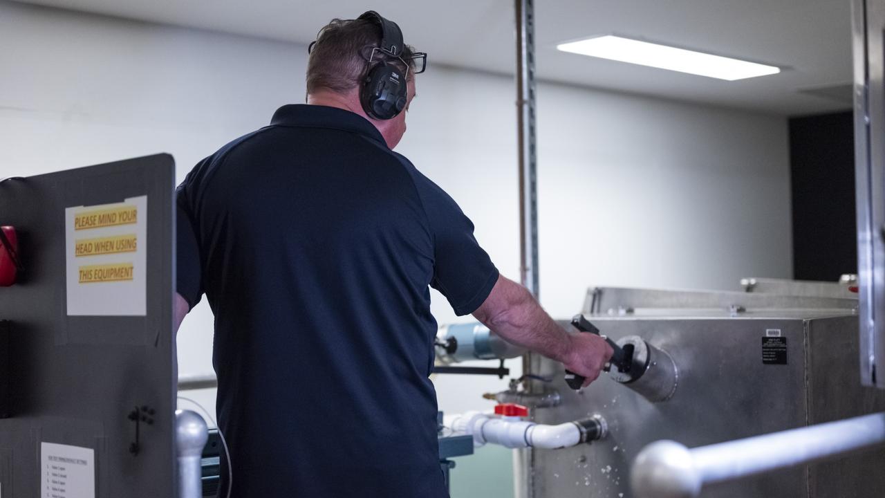 Fire in the hole - AFP experts at the Forensic Facility in Canberra. Picture: NCA NewsWire / Martin Ollman