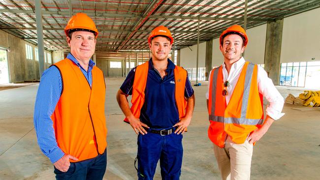 BMI Group’s John Curtis, Myles Tredinnick and Michael Irvine inside one of the massive warehouse/showrooms at The Depot. Picture: AAP/Richard Walker