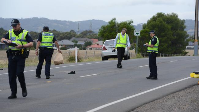 Police at the scene of the fatal accident on Black Rd, O'Halloran Hill. Picture: AAP / Brenton Edwards